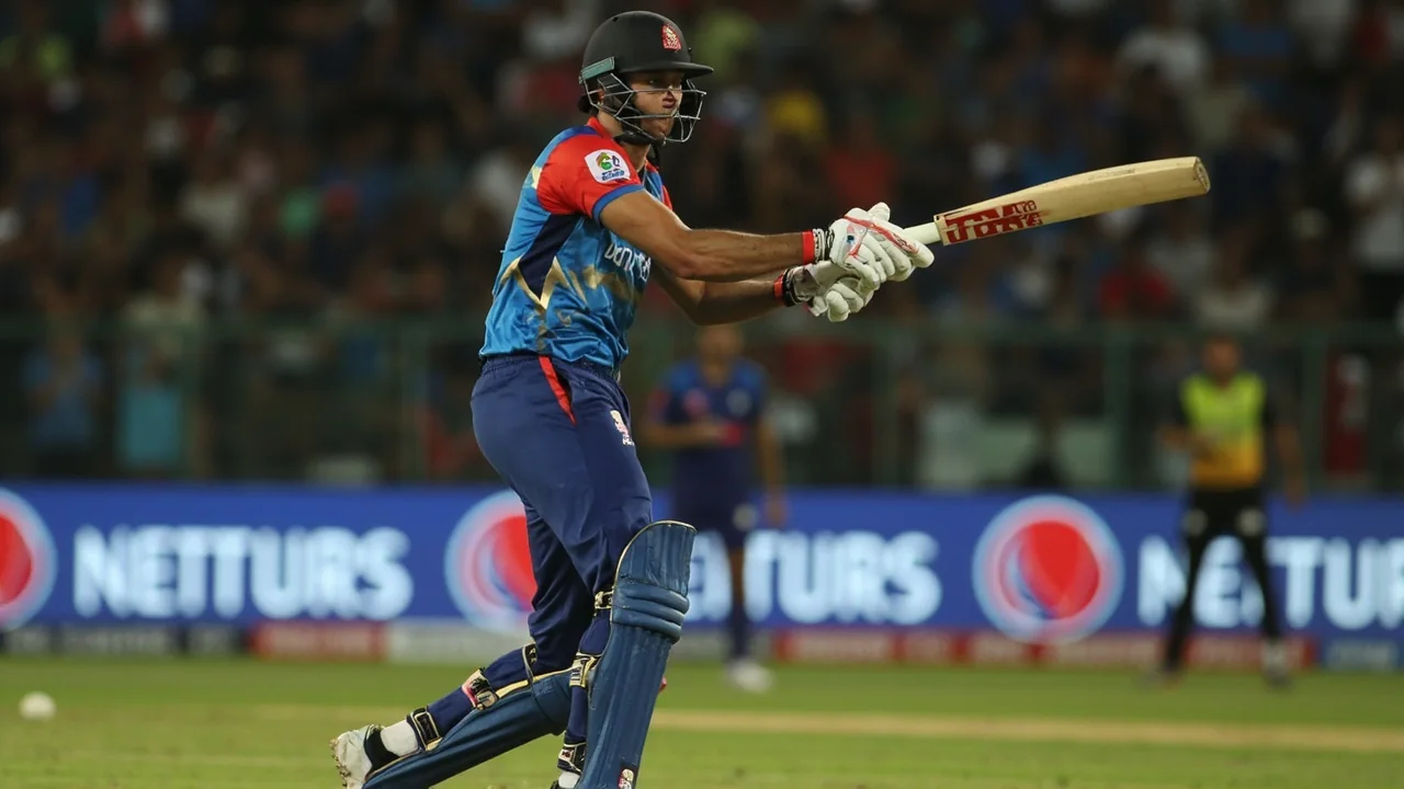 Close action frame of a young Indian batsman playing an attacking shot during a domestic T20 fixture